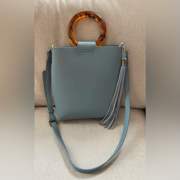 By Anthropologie Handbags - Anthropologie Blue Bag with Tortoise Handle & Fringe